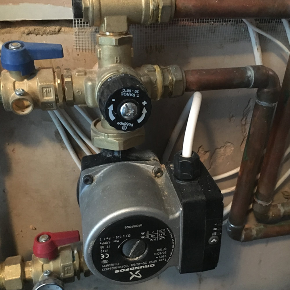 Central heating pipes and pump