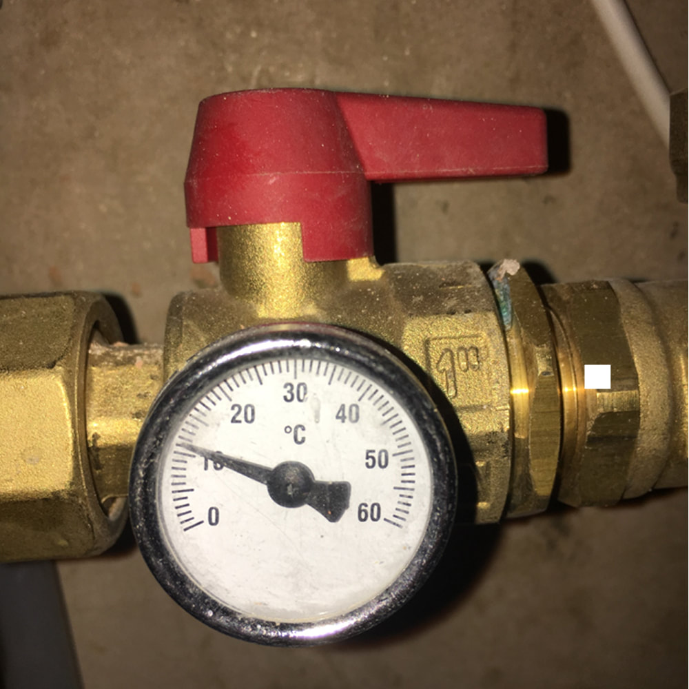 Arco service boilers in Romford. Close up of pressure valve dial