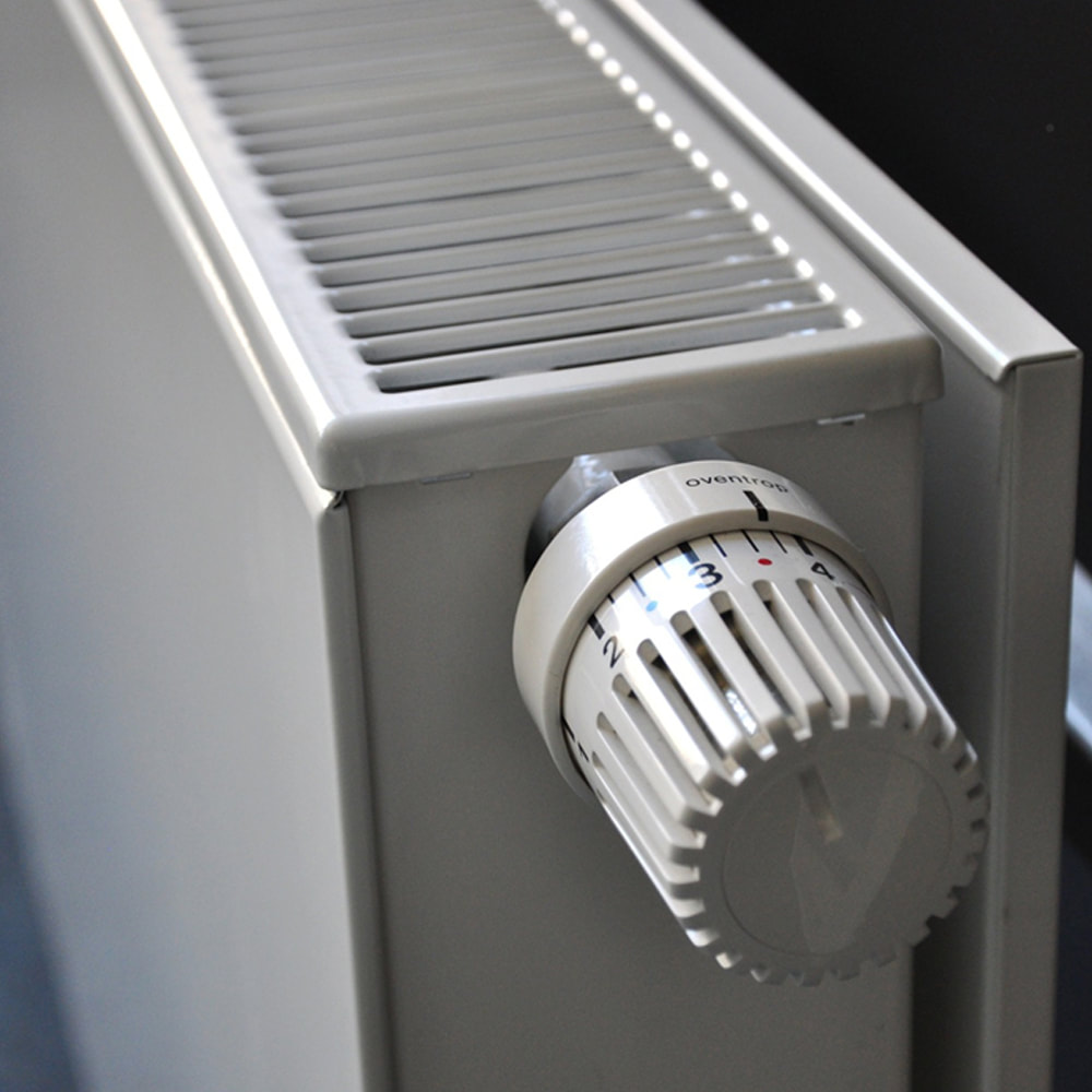 Arco, central heating installators in Romford. Close up of a radiator and dial